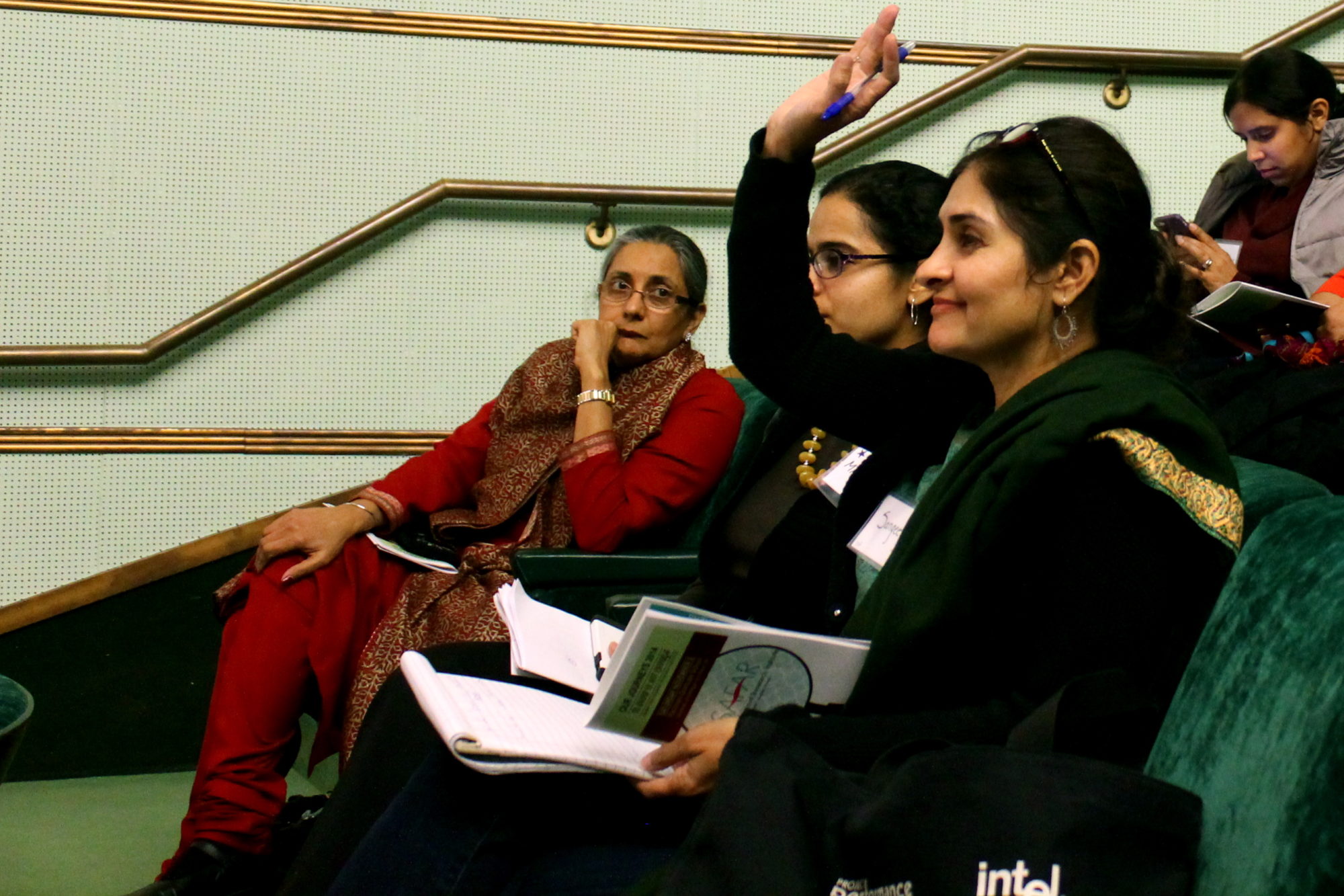 Dr. Sangeeta Luthra asks a question, Inni Kaur looks on